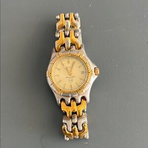 Used Bulova Gold and Silver Two-Tone Watch with Intricate Bracelet